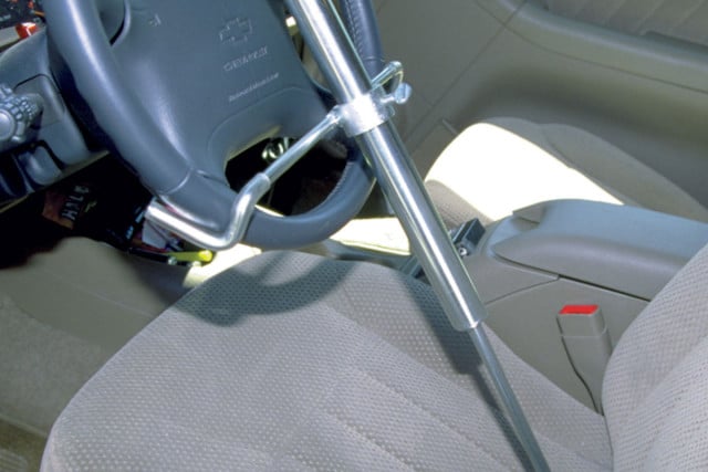 This is a steering wheel lock. It keeps the steering wheel from turning while adjusting toe. Image via awdirect.com