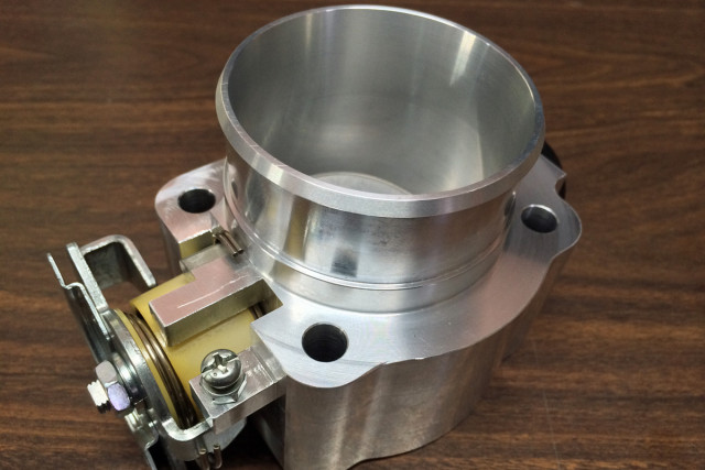 Hypersports manufactures their own billet throttle body for this application.
