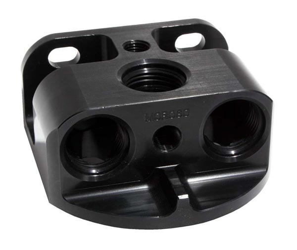 Moroso offers two different styles of remote oil filter mounts. Like the side port-style part we used in our installation, this front port-style mount (PN. 23764) is made from billet aluminum and has two -12AN inlets and three outlets (one -12AN and two 1/4" NPT).