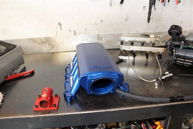 If you’re familiar with Holley’s late model intake manifolds for other EFI applications, as well as what many aftermarket hand made, sheet metal intakes look like, you’ll quickly recognize many of those attributes on this manifold.