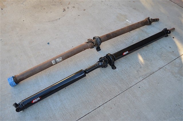 When a driveshaft becomes too long, it is best done in two pieces. Our old driveshaft paired next to our new J.E. Reel driveshaft.