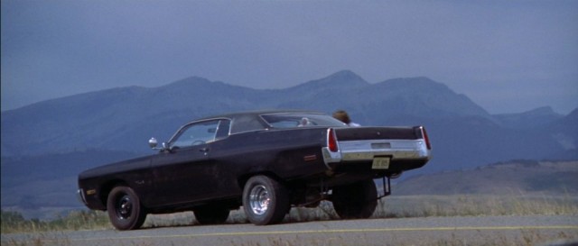 The jacked-up 1973 Plymouth Fury III.