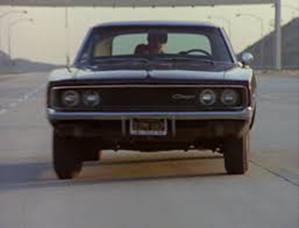 A sweet 1968 Dodge Charger 500 hunts down Sam and Paula.