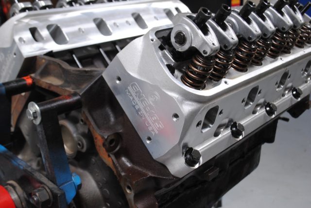 The Edelbrock, aluminum E-CNC heads feature high-flow, 185cc intake ports; 75cc exhaust ports; and 59cc combustion chambers. Note the use of beehive springs and Comp Cams cast-aluminum roller rockers. 