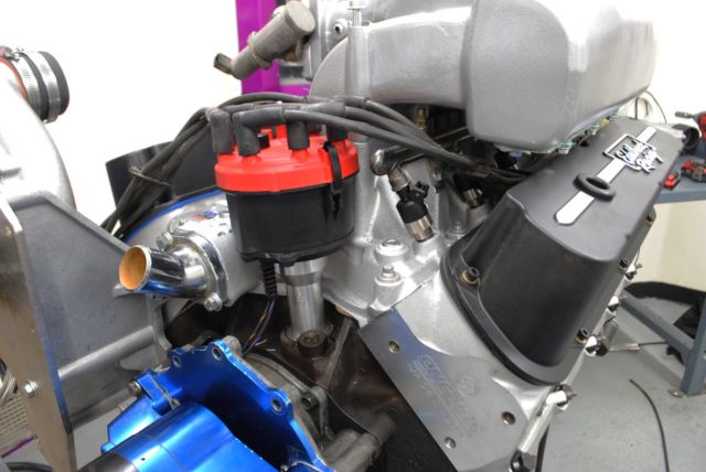This MSD billet distributor and matching plug wires handled the ignition chores. Spark energy is doubly important on a supercharged application. 