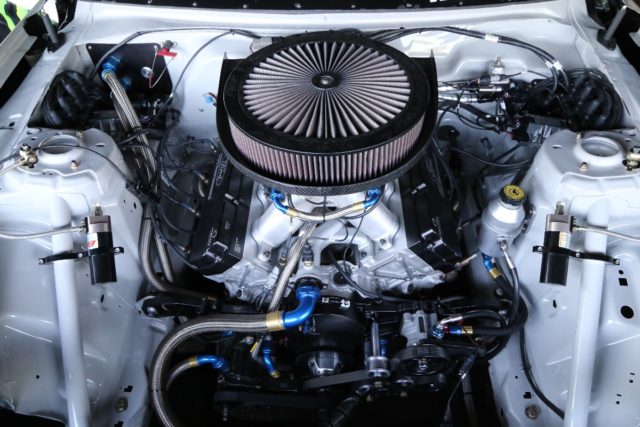 “Our big, big improvement, though, is our new engine. We work with Ford Performance and Roush Yates to effectively take the FR9 NASCAR technology — which is traditionally 358 cubic inches in an iron block — and we have 455 cubic inches with an aluminum block,” Vaughn said. “So, the car makes about 1,000 horsepower, naturally aspirated and it is just unbelievable. It’s like 650 lb-ft of torque at 3,000 rpm.”