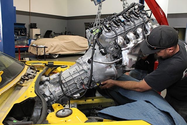 Once the manual transmission conversion was complete, we slid in the LS7 and Tremec TR6060. 