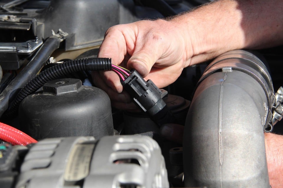image of Flex-A-Lite harness plugging directly into the factory 6.0-liter pigtail