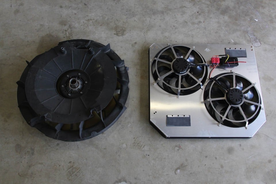 image of factory fan next to new Flex-A-Lite fan on garage floor