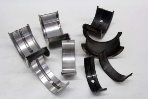 Rod and main bearings can be condensed into two basic categories – production style bi-metal aluminum versions (left) and the more performance oriented tri-metal bearings constructed of a lead-copper alloy with a very thin lead-tin overlay (right). These different bearings may appear to perform the same job, but their performance characteristics are completely different.